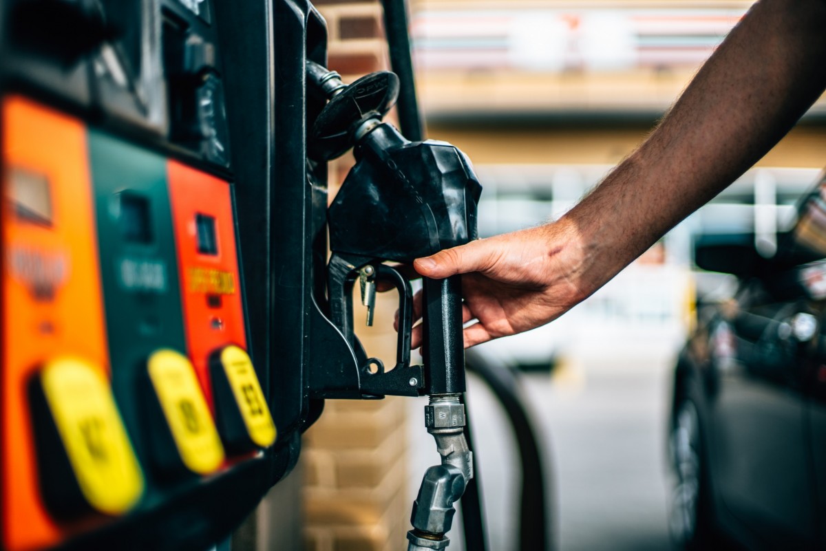 Person pumping gas into their car