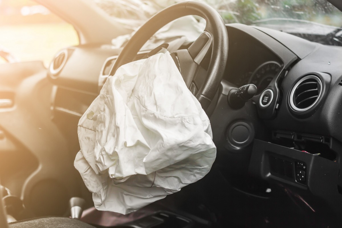 deployed airbag in car